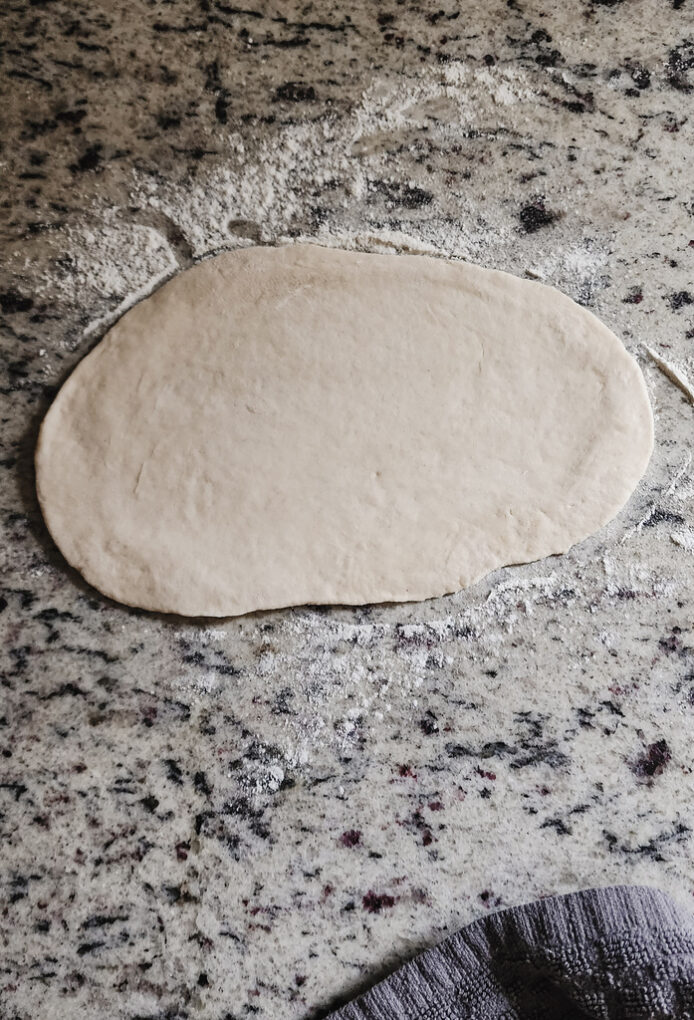 Naan bread, rolled flat