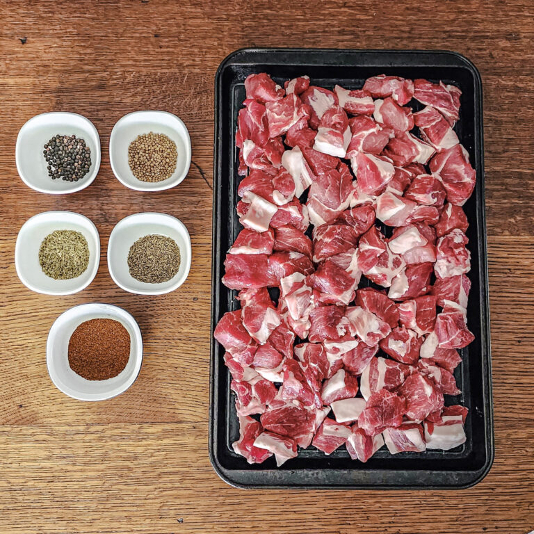 Pork shoulder and rub ingredients for carnitas