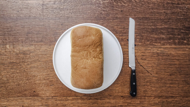 White bread loaf ready to slice.