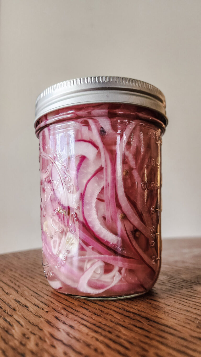 A jar of pickled onions.