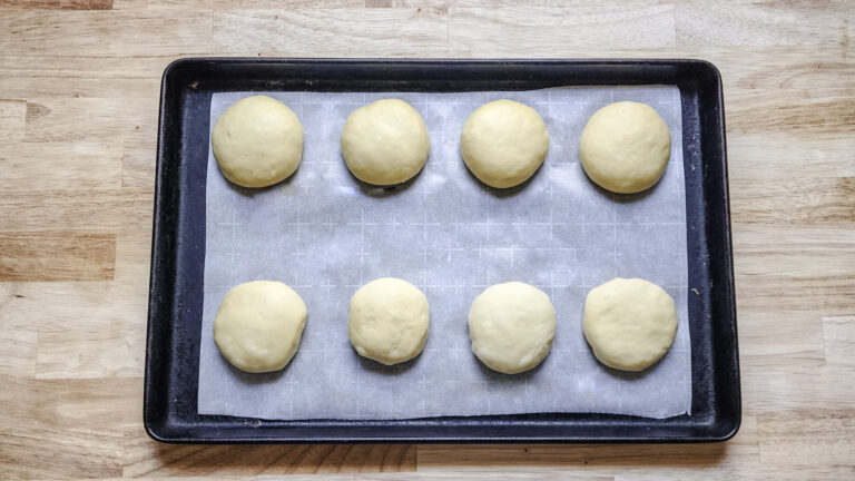 Brioche bun dough shaped and flattened  for second rise