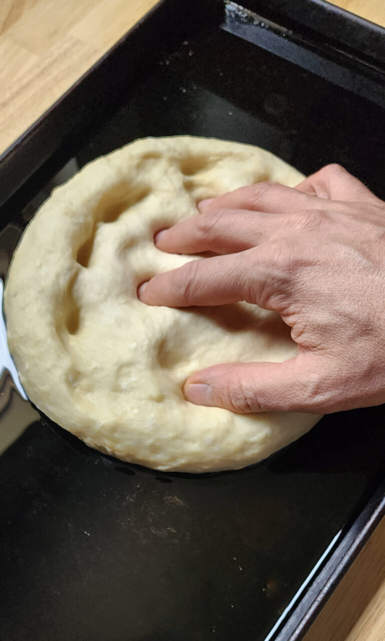 Spreading Focaccia Dough into pan