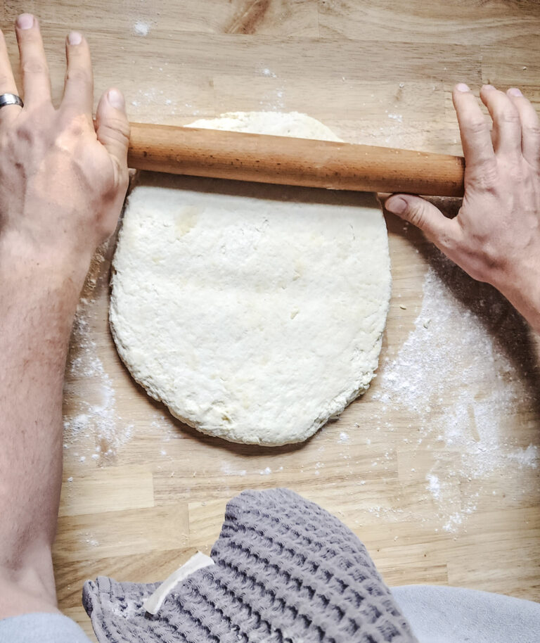 Rolling and folding buttermilk biscuit dough