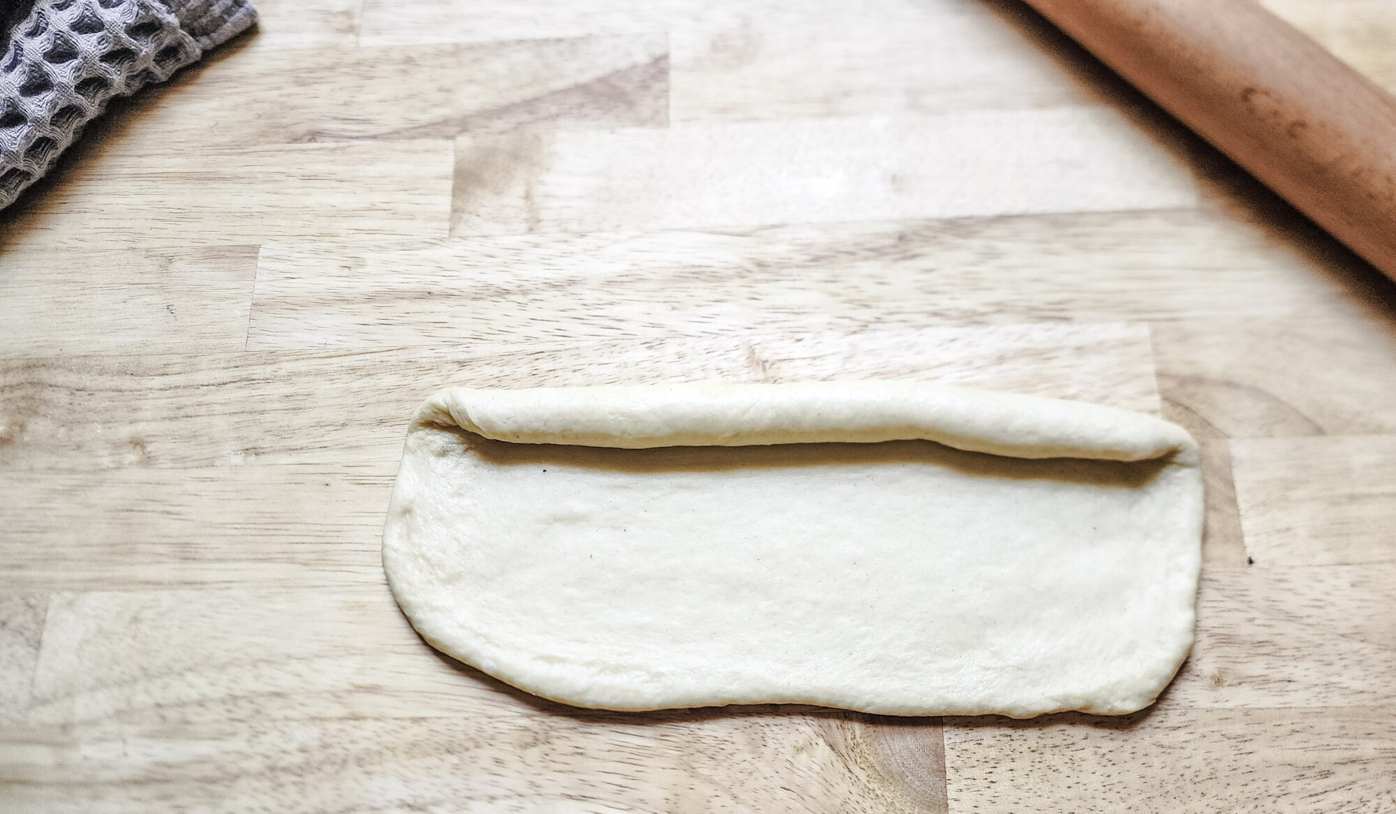 Rolling the dough into a loaf