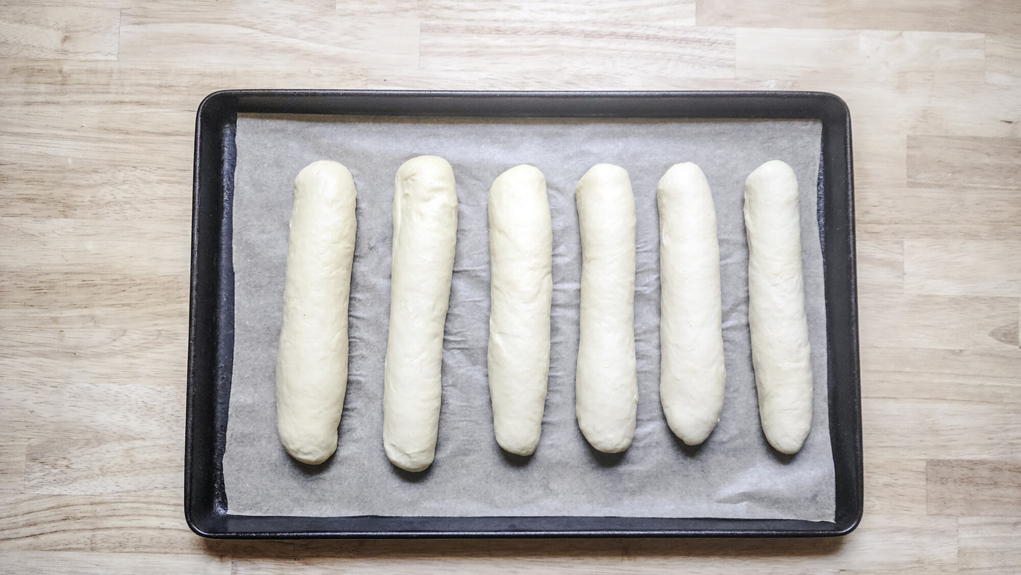 Sub roll loaves ready for the second proof