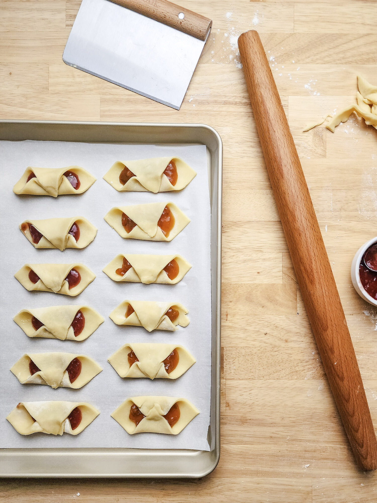 Kolaczki cookies shaped and ready to be baked.