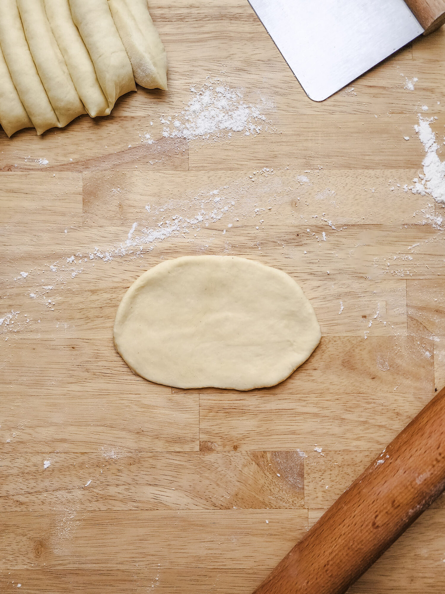 Brioche dough rolled into an oval shape