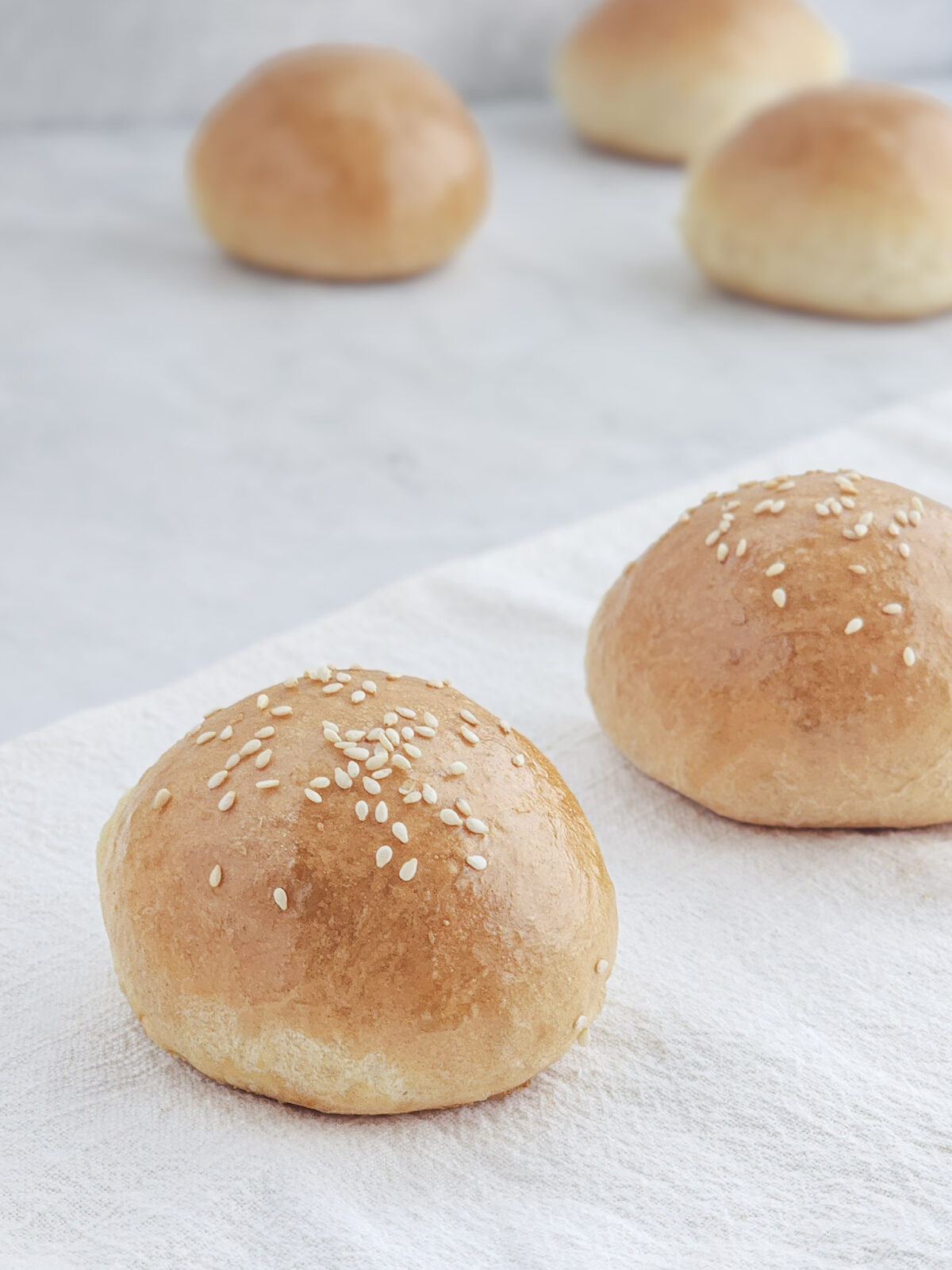 Homemade Brioche Buns with Sesame Seed Topping