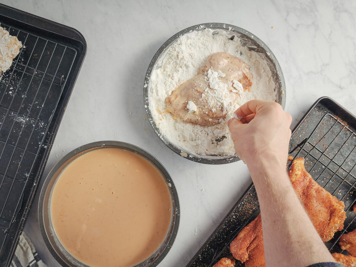 Return the wet chicken to the dry ingredients.