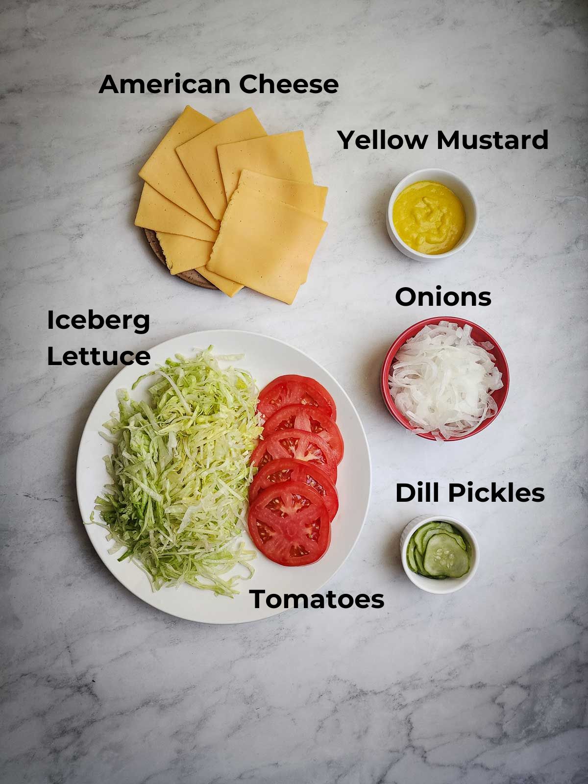 Double-Double Animal Style Smash Burger Toppings: American Cheese, Yellow Mustard, onions, iceberg lettuce, tomatoes, and dill pickles.