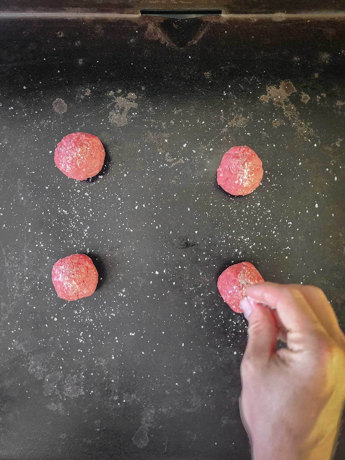 Double Double Animal Style Smash Burger Step 3: Add as many meat balls as you can, two per burger to the griddle or pan, and season generously with salt.