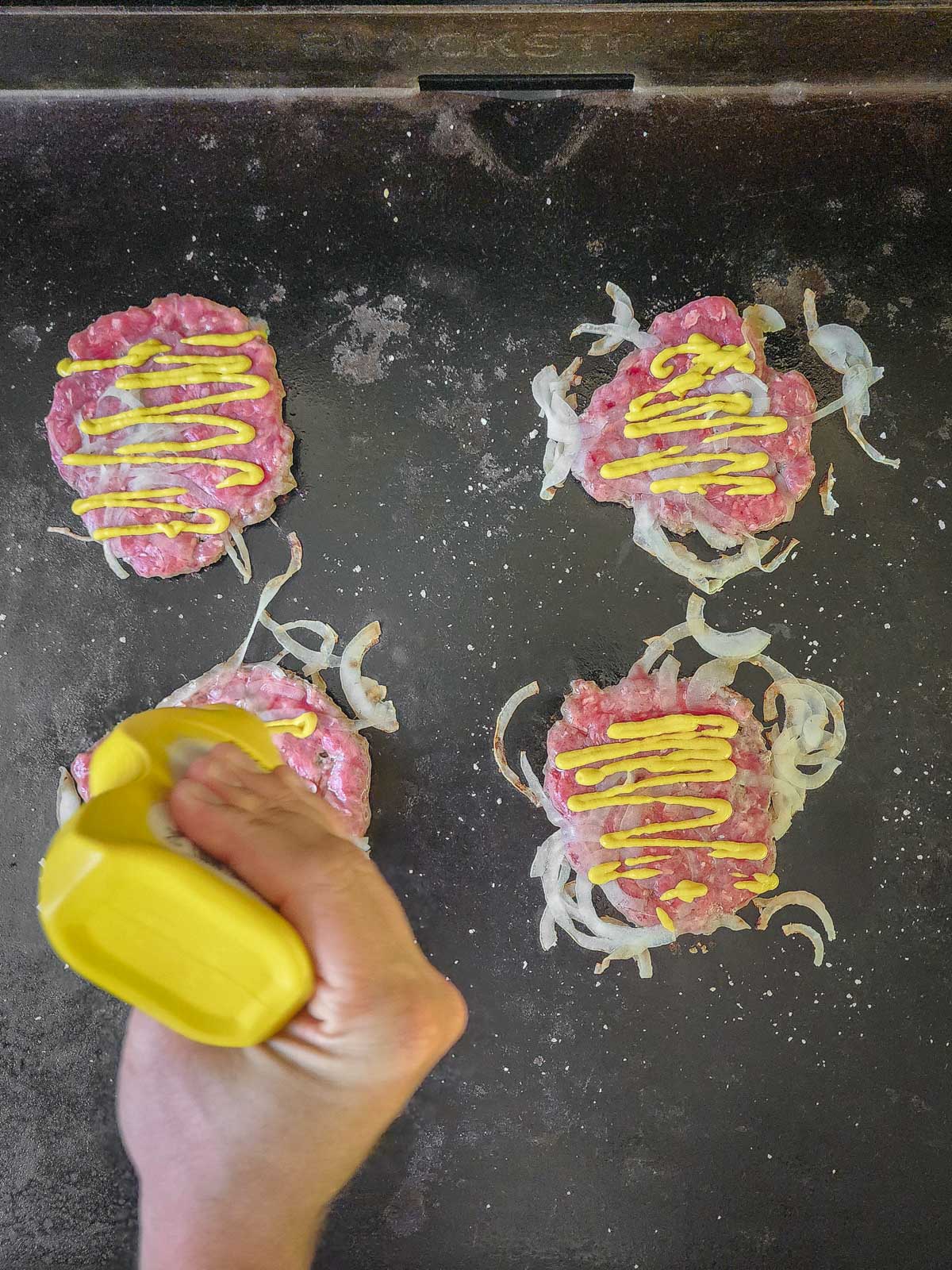 Double Double Animal Style Smash Burger Step 5: Add a teaspoon or two of yellow mustard to the top of the patties as they are cooking.