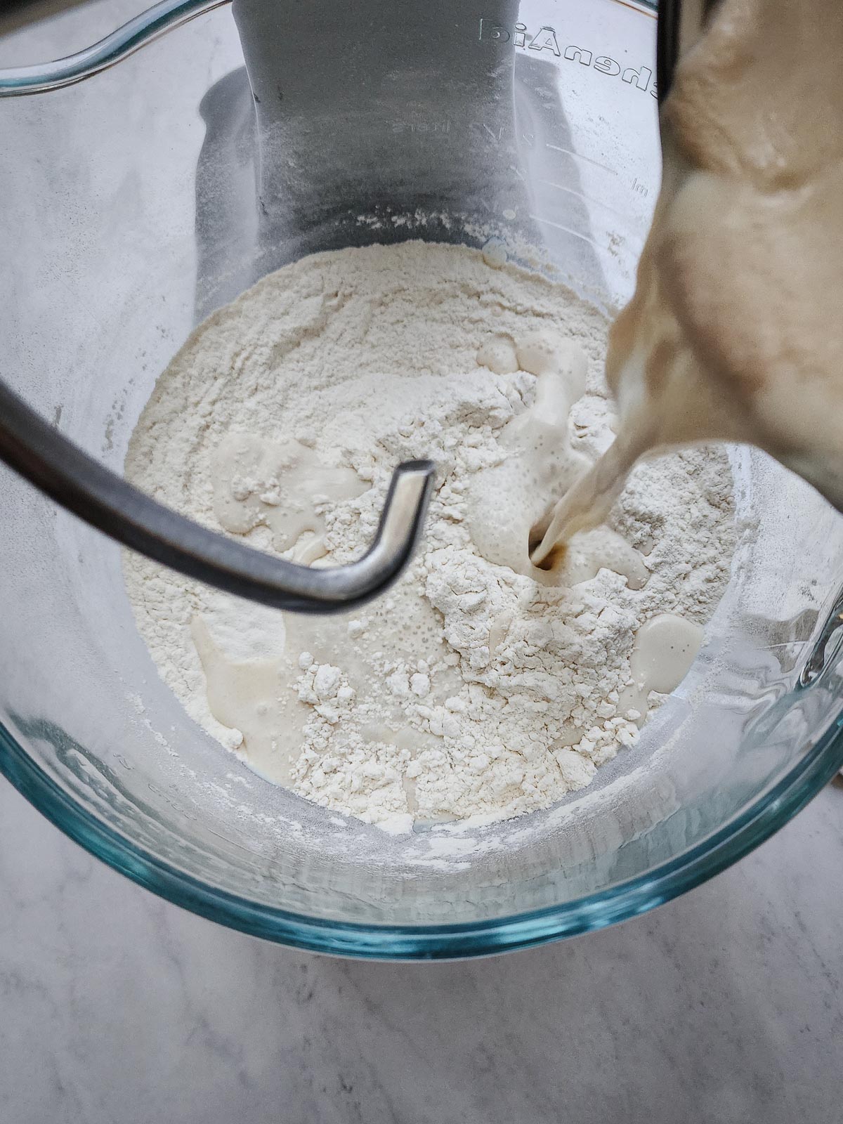 Chai-Spiced Cinnamon Rolls Step 3: Add the yeast mixture to the the dry ingredients, and combine on low for 1 minute.