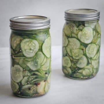 Easy refrigerator dill pickle slices in mason jars.