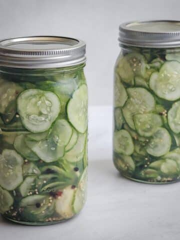 Easy refrigerator dill pickle slices in mason jars.