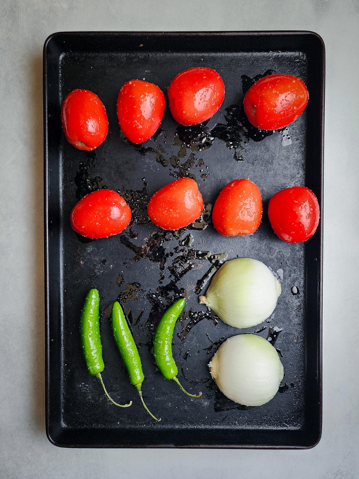 Fire-roasted blowtorch salsa step two: place the vegetables on a baking sheet.