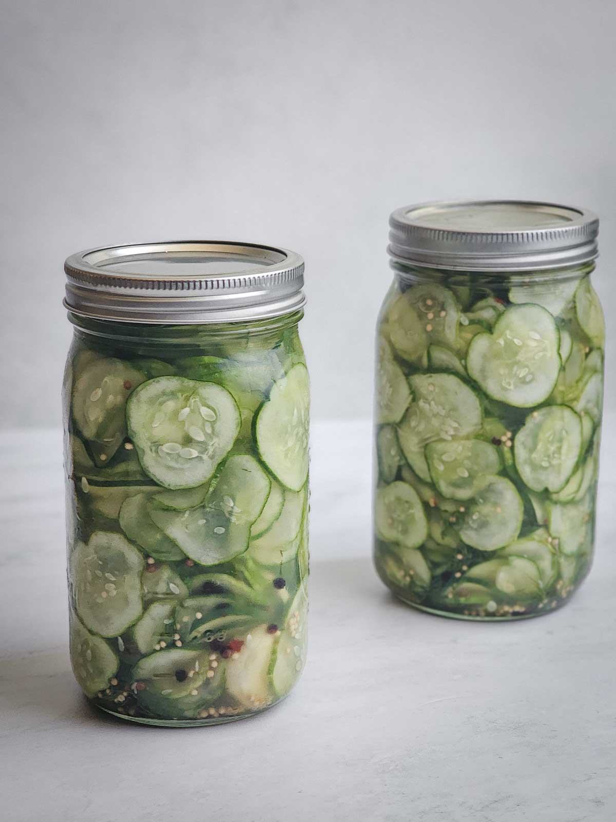 Easy Refrigerator Dill Pickle Slices in mason jars.